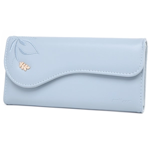 Detail of light blue tri-fold wallet with wave edge cover and leaf embroidery charm