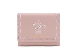 Close-up of pink PU leather trifold wallet featuring flower embroidery and gold logo