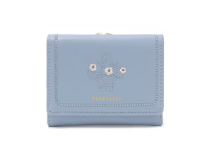 Detail of light blue PU leather wallet with floral embroidery and gold logo lettering