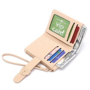 Short quilted wallet for women with wristlet strap and multiple card slots in beige color