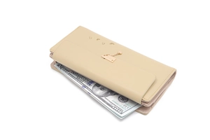 Detail view of large capacity beige tri-fold wallet showing card slots and cash compartment