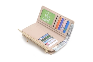 Detailed interior of women's long tri-fold wallet showing card slots and zipper pocket