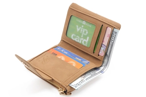 Inside view of women's leather trifold wallet showing card slots and zipper pocket