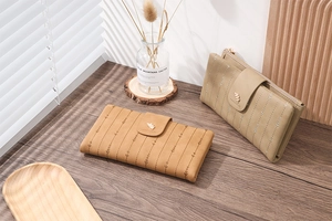 Detailed embroidery and golden leaf clasp on stylish women's long PU leather wallets