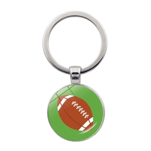Green American football keychain pendant with brown ball design on silver ring holder