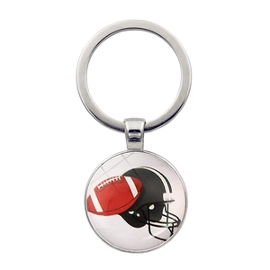 American football keychain with black player helmet sports pendant on white background