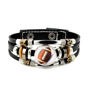 Detail of multi-layer braided leather bracelet with rugby glass charm and wooden beads