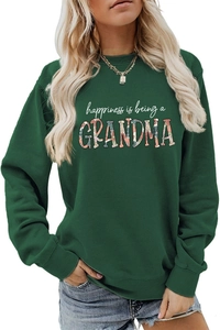 Detailed close-up of floral GRANDMA letter print on dark green cotton sweatshirt