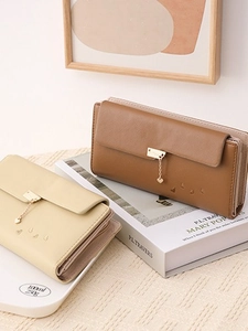 Three-fold PU leather long wallet for women with heart pendant and embossed pattern