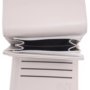 Women's trifold leather wallet in soft grey with multiple card slots and zipper pocket