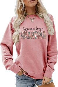 Detail of pink sweatshirt featuring Happiness is being a GRANDMA floral lettering print