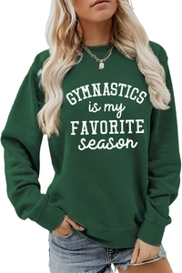 Detail of forest green sweatshirt with white GYMNASTICS text print and ribbed cuffs