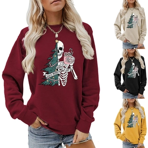 Detail view of Sorta Merry Sorta Scary sweatshirts in burgundy, beige, black and ginger