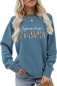 Detail of blue sweatshirt showing floral Happiness Is Being A Grandma print and cotton fabric