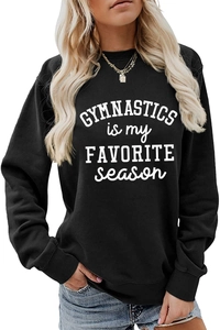 Detail of black gymnastics quote sweatshirt showing ribbed neckline and white print