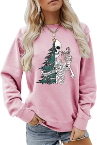 Detail of pink sweatshirt featuring Sorta Merry Sorta Scary festive graphic print