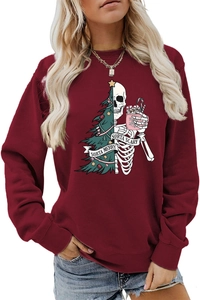 Detail of the Sorta Merry Sorta Scary graphic print on a maroon crewneck sweatshirt