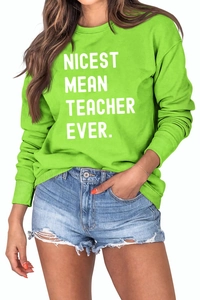 Detail of ribbed cuffs and white bold slogan print on neon green sweatshirt