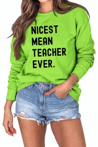 Detail of lime green long sleeve sweatshirt with black Nicest Mean Teacher Ever text