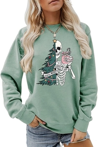 Detail of Sorta Merry Sorta Scary Christmas tree and skeleton graphic on green sweatshirt