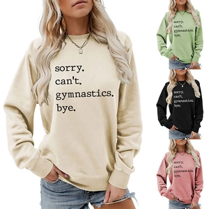 Detail view of cotton sweatshirt color palette featuring printed gymnastics slogan