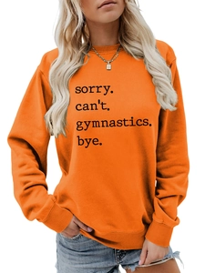 Detail of orange sweatshirt with rib-knit cuffs and printed gymnastics slogan