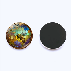 Detailed view of bee and floral crystal glass fridge magnet with magnetic back