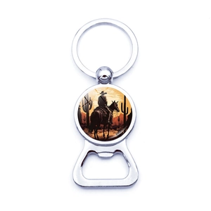 Detail of silver cowboy sunset silhouette bottle opener keychain with metallic finish
