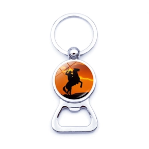 Polished metal keychain bottle opener featuring a sunset western cowboy silhouette charm