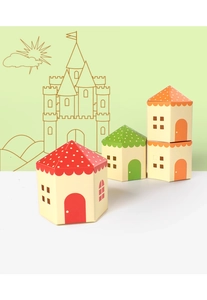 Dettaglio di scatole regalo a castello colorate per biscotti con motivi di tetti e finestre