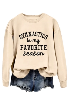 Beige crew neck sweatshirt featuring gymnastics letter print and ribbed cuffs