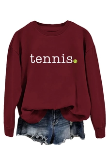 Close-up of burgundy crewneck sweatshirt with white tennis text and ball print design