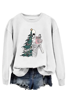 Detail of Sorta Merry Sorta Scary Christmas tree and skeleton print on white sweatshirt
