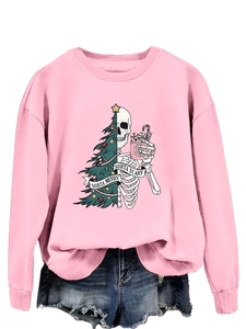 Detailed view of pink sweatshirt with Sorta Merry Sorta Scary Christmas skull print