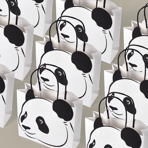 Cute panda cartoon gift bag set with black polka dots and rope handles for kids birthday