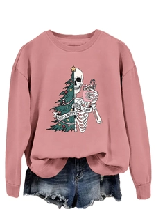 Detail of pink crewneck sweatshirt featuring Sorta Merry Sorta Scary holiday graphic prints