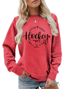 Detail of red hockey mom sweatshirt featuring ribbed cuffs and high-quality cotton texture