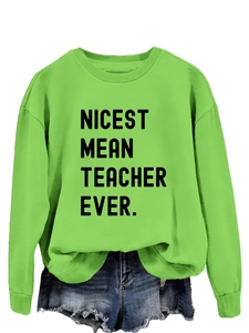 Detail of green long sleeve sweatshirt with Nicest Mean Teacher Ever print and ribbed cuffs