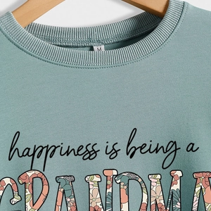 Sage green crewneck sweatshirt with happiness is being a grandma floral print graphic