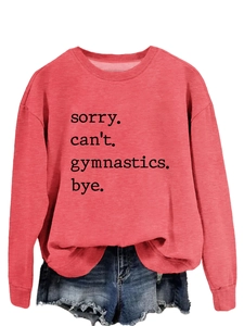 Detail of coral pink gymnastics slogan sweatshirt with ribbed crew neck and print