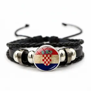Detail of multi-layer leather bracelet featuring Croatia flag glass cabochon charm