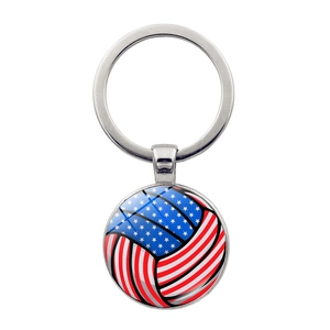 Close-up of a volleyball keychain with American flag motif and polished metal ring