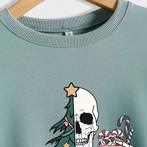 Morandi blue sweatshirt featuring creative Christmas tree and skull graphic print