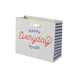 White gift paper bag with blue stripes and Happy Everyday To You slogan and satin handles