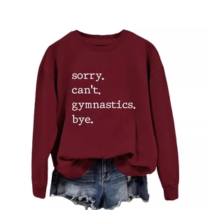 Maroon crewneck sweatshirt featuring white 'sorry can't gymnastics bye' graphic print