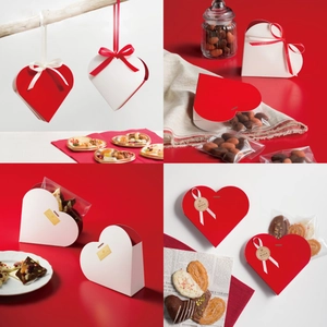 Creative red and white heart-shaped gift box with elegant ribbon for Valentines Day gifts