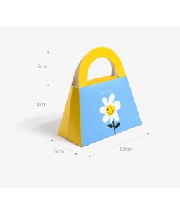 Detail of yellow and blue wedding candy box with daisy design and size dimensions
