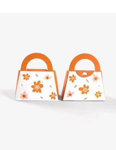 Detail of floral trapezoid gift bags with orange handles and smiling sun flowers