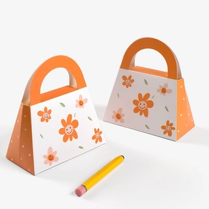 Minimalist handheld paper gift bags with orange sun flower designs for wedding favors