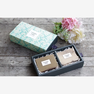 Rectangular drawer gift box with two handmade soaps and green damascus pattern lid